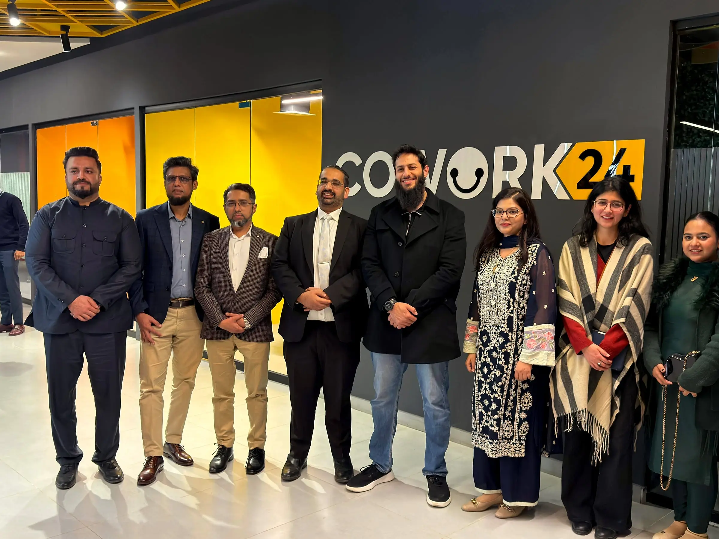 Usman with fellow panelists and organisers after a panel